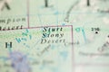Shallow depth of field focus on geographical map location of Sturt Stony Desert Australia Oceania continent on atlas Royalty Free Stock Photo