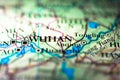 Shallow depth of field focus on geographical map location of Wuhan city in Hubei China Asia continent on atlas