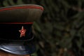 Shallow depth of field. A symbol of a Soviet soldier: a cap with a five-pointed star. Officer of the USSR during the Great Patriot