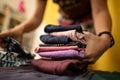 Shallow depth of field image with the hands of a mother rearranging her little daughter clothes Royalty Free Stock Photo