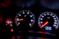 Shallow depth of field image selective focus with the dashboard lights of a 2010 car Royalty Free Stock Photo