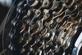 Shallow depth of field selective focus details of a bicycle pinion gearbox and chain Royalty Free Stock Photo
