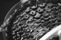 Shallow depth of field selective focus details of a bicycle pinion gearbox and chain Royalty Free Stock Photo