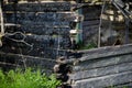 Shallow depth of field selective focus details with burned wood from a burnt house Royalty Free Stock Photo