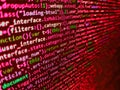 Shallow depth of field, selective focus effect. Lines of code of a software with several colors. Concept of security, programming Royalty Free Stock Photo