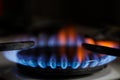 Shallow depth of field selective focus image with a burning old traditional gas stove top Royalty Free Stock Photo