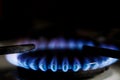 Shallow depth of field selective focus image with a burning old traditional gas stove top Royalty Free Stock Photo