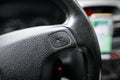 Shallow depth of field selective focus image with the honking button on the steering wheel of a car from 2008 Royalty Free Stock Photo
