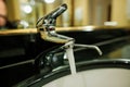 Shallow depth of field selective focus image with water running from a faucet and a soap dispenser in a hotel bathroom Royalty Free Stock Photo