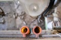 Shallow focus of a pair of rubber milking teats used for connecting to a cow`s udder prior to milking. Royalty Free Stock Photo