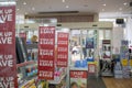 Shallow focus of Sales Banners seen within a well-known book store and stationary seller.