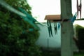 Shallow focus shot of an empty laundry rope with pegs
