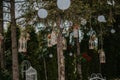 Shallow focus shot of an outdoor wedding ceremony reception hanging decorations Royalty Free Stock Photo