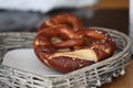 Shallow focus shot of soft pretzels placed in a food basket