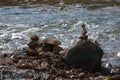 Shallow focus shot of a stack of balancing rocks in the water - zen concept