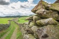 Shallow focus of stacked stones making up part of a very old meadow stone wall in the heart of the Yorkshire Dales.