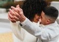 Shallow focus of a young romantic couple dancing and kissing outdoors Royalty Free Stock Photo