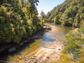 Shallow river in the rain forest. Royalty Free Stock Photo