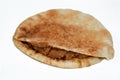 Shami Syrian pita bread with mashed fava beans mixed with oil, sesame tahini, cumin, spices, selective focus of traditional