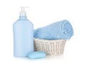 Shampoo bottle, soap and blue towel