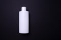 Shampoo or hair conditioner bottle isolated on black background Royalty Free Stock Photo