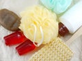Shampoo and liquid shower gel with bath puff and loofah spa kit top view Royalty Free Stock Photo