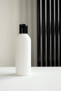 Shampoo or shower gel white black plastic bottle. Beauty body care cosmetic mockup