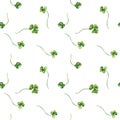 Shamrock and clover watercolor seamless pattern isolated on white background. Painted green four leaves. Hand drawn Royalty Free Stock Photo