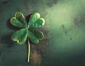 Shamrock on grunge green background with copy space. St Patrick day background