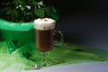 Shamrocks and Irish coffee on dark Royalty Free Stock Photo