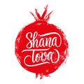 Shana Tova hand lettering with brush stroke red pomegranate. Jewish New Year Rosh Hashanah greeting card. Royalty Free Stock Photo