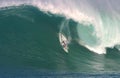 Shane Dorian Surfing at Waimea Bay Royalty Free Stock Photo