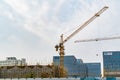 SHANGHAI, CHINA APRIL, 2017 : A crane is working on building construction site at Hi-Tech park industrial estate Royalty Free Stock Photo