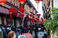 View of Old Street with massive tourists in face masks in Qibao Old Town