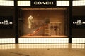 Facade of COACH store window display Royalty Free Stock Photo