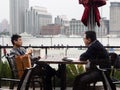 Two men having a meeting at a cafe in Shanghai Royalty Free Stock Photo