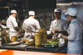 Shanghai, China - May 27, 2019: Chinese chefs work in the kitchen of restaurant Royalty Free Stock Photo