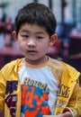 Closeup of boy in howdy shirt, Shanghai, China