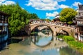 Shanghai, China - May, 2019: Landscape of Qibao Old Town in Shanghai, China. Brick bridge over the river in Qibao