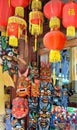 SHANGHAI, CHINA - May 7, 2017 - Souvenir wooden chinese masks on market near Yu Garden, Shanghai