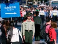 Chinese armed police command traffic in line on Nanjing Road