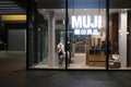 MUJI retail store and brand logo at night. Royalty Free Stock Photo