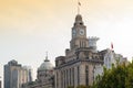 The Customs House located next to The Hong Kong and Shanghai Banking Corporation HSBC Building on the Bund in Shanghai, China Royalty Free Stock Photo