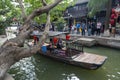 Chinese traditional rowboat sightseeing tour in Zhujiajiao Ancient Water Town, famous tourist destination in Shanghai, China