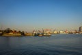 SHANGHAI, CHINA: Shanghai riverbank, industrial boats and some port facilities lying waterfront, beautiful blue sky