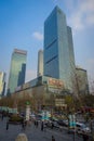 SHANGHAI, CHINA: Walking around the traditional Jing`an temple neighborhood, modern tall office buildings in background Royalty Free Stock Photo