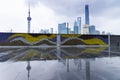 Shanghai Financial Center and modern skyscraper city with reflection of buildings on rain, waterfront of the Huangpu River is a Royalty Free Stock Photo