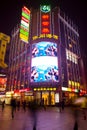 Neon signs at Nanjing Road, a mayor shopping street in downtown Shanghai. Royalty Free Stock Photo