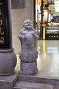 Shanghai, 2nd may: Buddha sculpture front of a Shopping Center entrance from Nanjing pedestrian Road in Shanghai