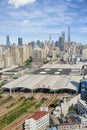 Shanghai Railway Station with city skyline in a cloudy day